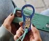 Pocket magnifier with cord