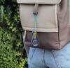 Pocket magnifier with cord